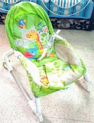 Baby's Green And White Bouncer Seat