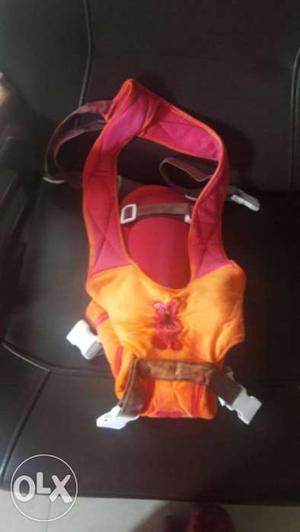 Baby's Red And Orange Carrier new unused