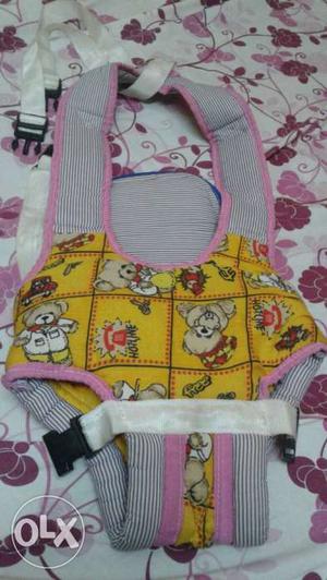 Baby's pink and Yellow Carrier