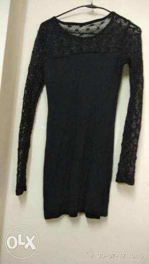 Black colour top with net in neck n hands