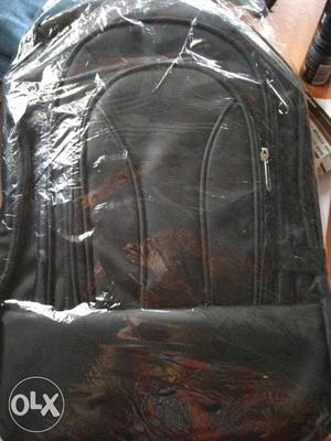 Black regular backpack.. new not even opened