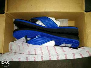 Blue-and-black Flip-flops In Box