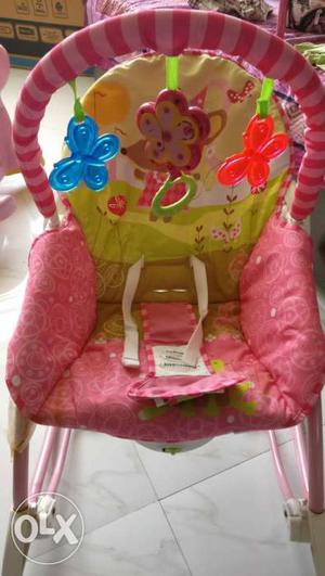 Fischer Price Toddler's Pink, Green, And White Bouncer Seat