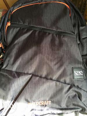 Gray And Orange Backpack