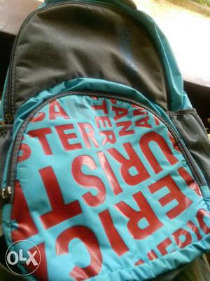Green, Red, And Blue Text Printed Backpack