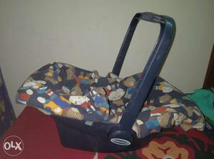 Mamalove baby carry cot; can be doubled up as