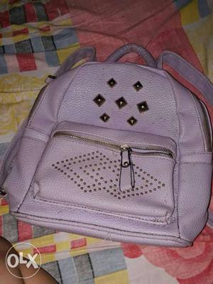 Mini school bag purse available in a good