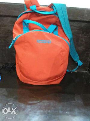 Orange And Teal Backpack