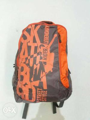 Skybags Laptop Gray And Orange Backpack