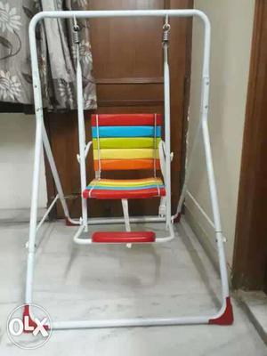 Toddler's White, Red, Yellow Indoor Swing