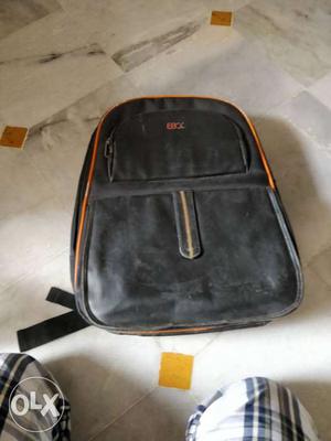 Used black laptop bag in leatherite with multiple