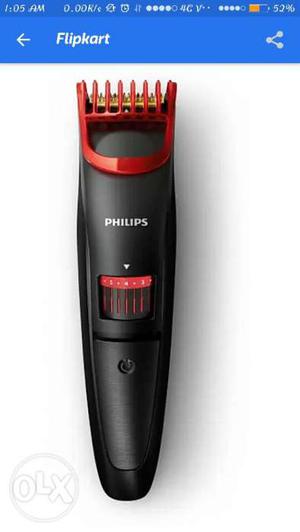 Black And Red Philips Electric Clipper