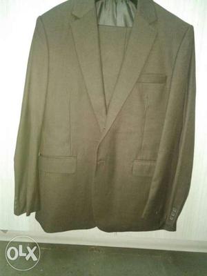 Brown blazer with pant. Unused and branded in good
