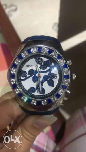 Diamond embellished white and blue watch