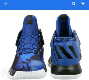 Pair Of Blue-and-black Basketball Shoes