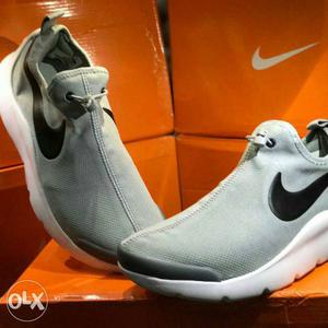 Pair Of Gray-and-black Nike Low Top Sneakers