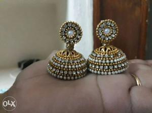 Pair Of White-and-gold-colored Jhumka Earrings