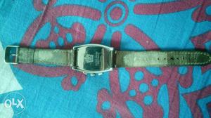 Rectangular Silver Watch With Black Leather Strap