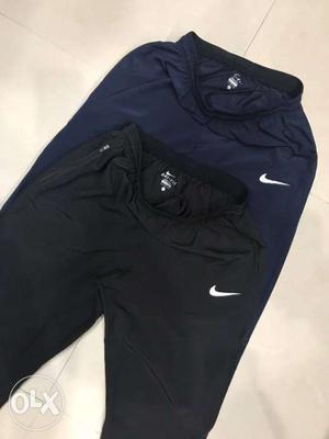2 Black And Blue Nike Sweatpants