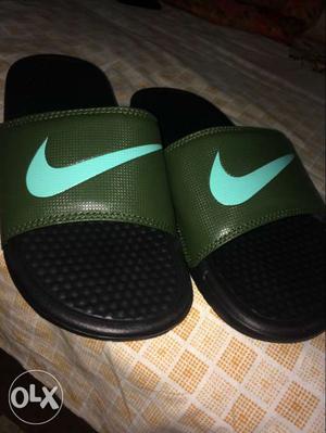 Black-and-green Nike Swoosh Slide Sandals