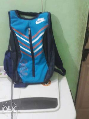 Blue, Black, White, And Red Nike Backpack