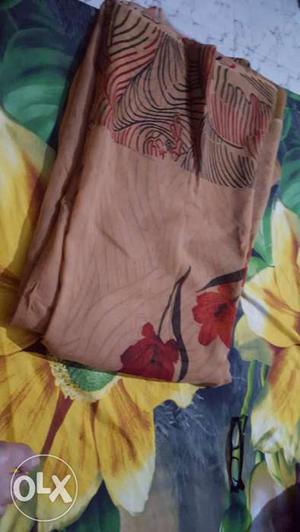 Brown, Red, And Black Floral Textile
