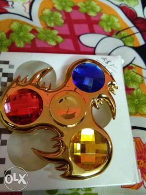 Gold With Sapphire, Amber, And Ruby Gemstone Fidget Spinner
