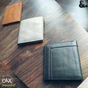 Men's wallets. Set of three, genuine leather
