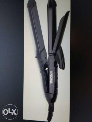 Nova straightener and curler. In mint condition. Very good