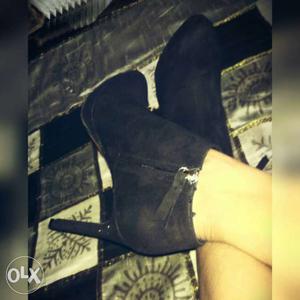 Pair Of Black Heeled Ankle Boots