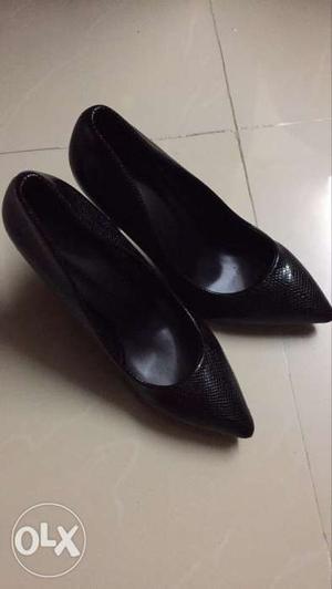 Pair Of Black Leather Pointed Heeled Shoes