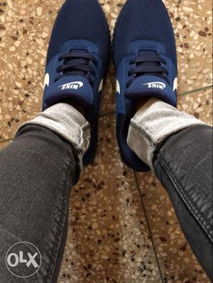 Pair Of Dark-blue Nike Low-top Sneakers