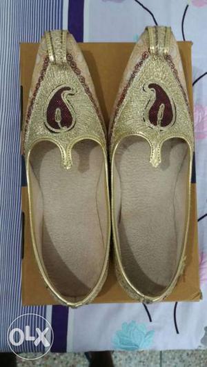 Pair Of Gold-and-brown Slip Ons On Box