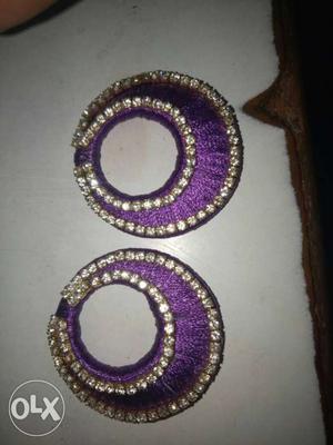 Pair Of Purple Diamond Earrings