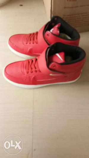 Pair Of Red used Nike Basketball Shoes