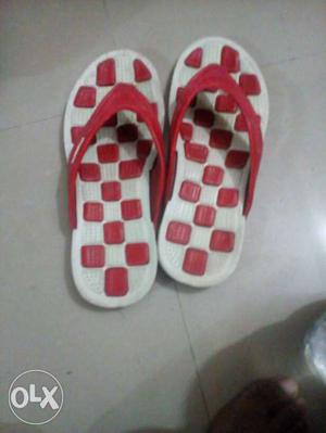 Pair Of White-and-red Flip Flops