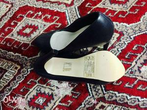 Pair Of Women's Black Shoes