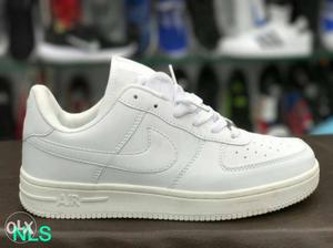 Paired White NIke Air Force One Low Shoe