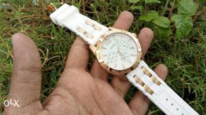 Round Gold And White Chronograph Watch With White Strap