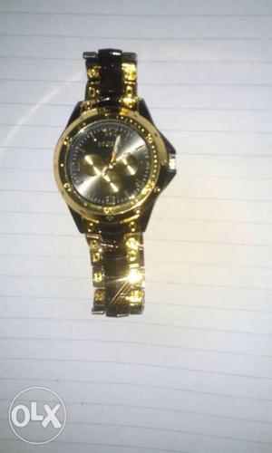 Round Gold Chronograph Watch With Gold Link