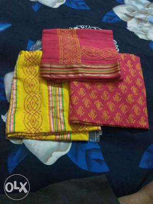 Three Yellow And Red Textiles