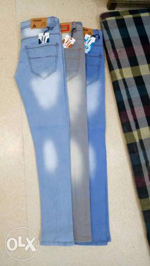 Two Blue And Gray Jeans