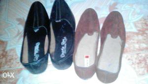 Two Pairs Of Black And Brown Slip-on Shoes