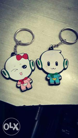 Two Pink And Blue Child Keychains