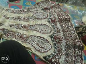 Unstiched red n cream colour bridal lehnga very