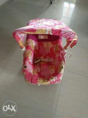 Baby's Pink And Beige Floral Carrier