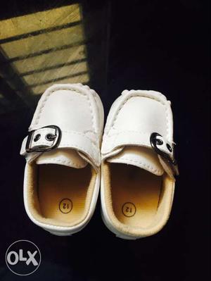 Baby's Size 12 Pair Of White Leather Slip-on Shoes