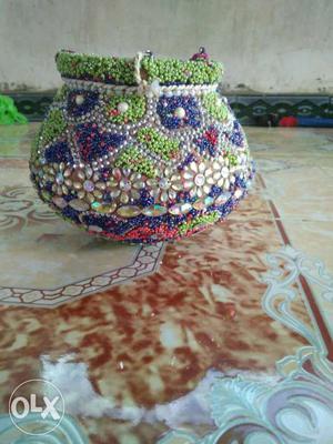 Green, Silver, Blue, And Red Beaded Vase