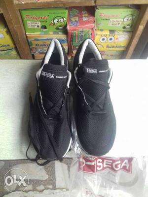 Pair Of Black Sega Low-top Sneakers