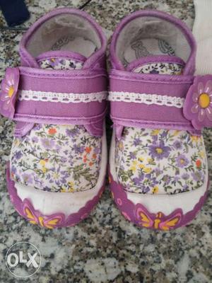 Pair Of Purple, White And Orange Floral Sandals